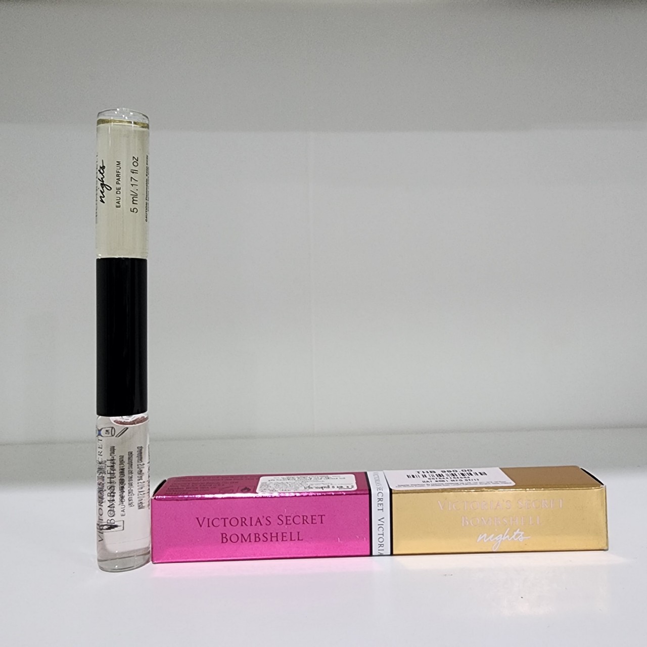 น้ำหอมจิ๋วมินิ Victoria's Secret Bombshells 5ml+ Bombshells night 5ml แบบลูกกลิ้งรวม10ml พกพาหัวลูกกลิ้งกล่องซีล เก่าเก็บขายถูก ผลิต 07/17