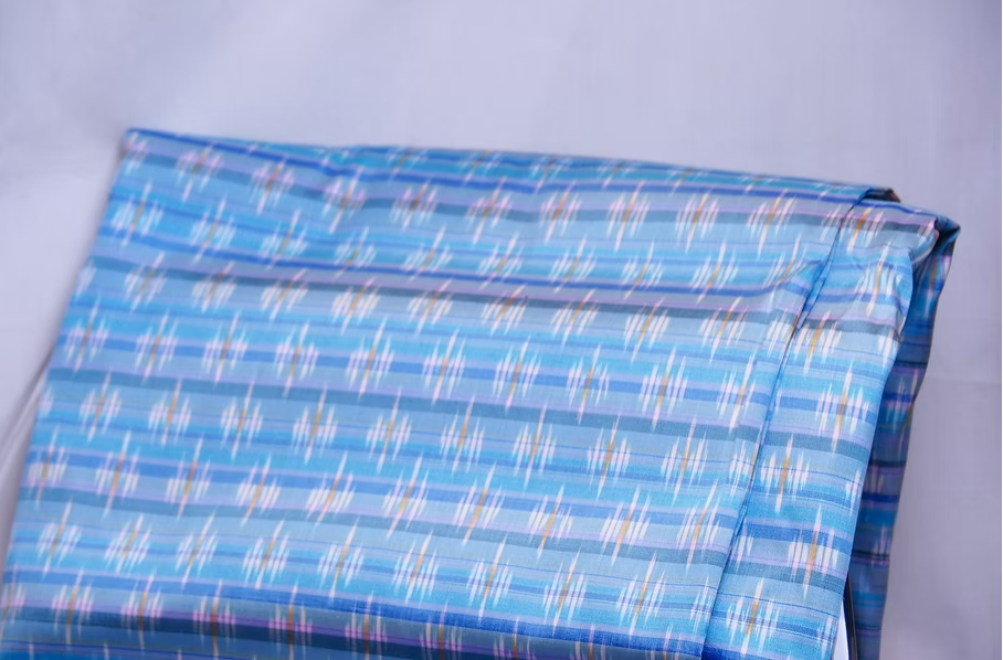 ซิ่น ผ้าไหมมัดหมี่ ผ้าไหมมัดหมี่ลายโคมห้ายืน สีฟ้า เลือกตามขนาด รหัส CISP-CT-100195