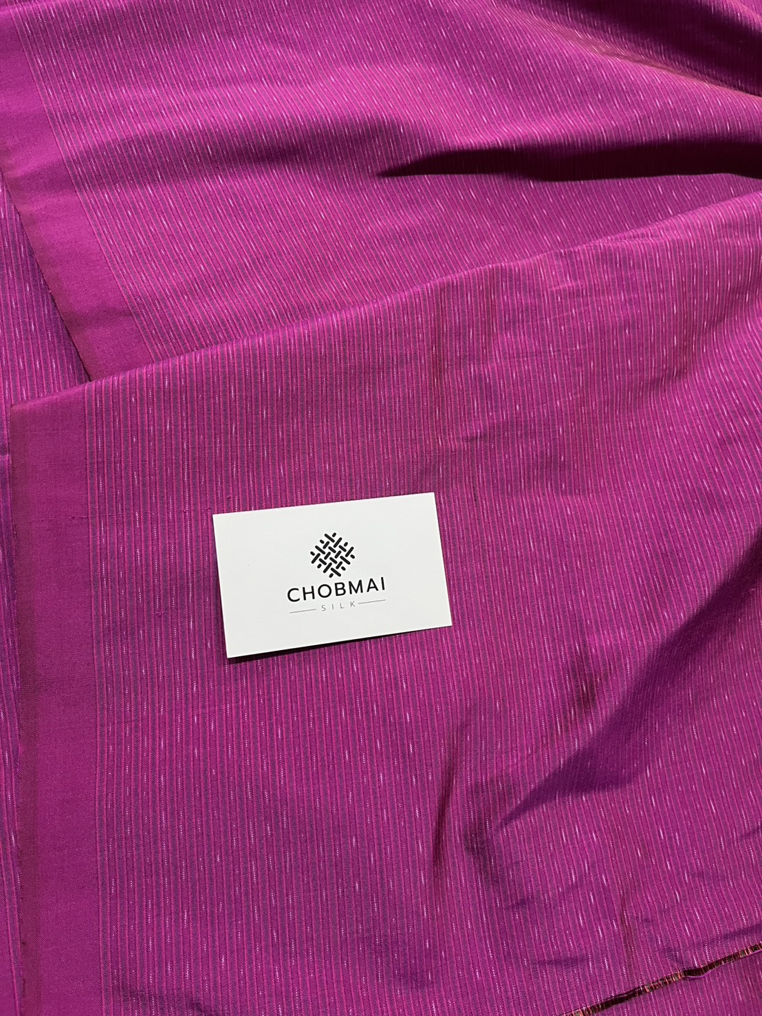 ผ้าไหมมัดหมี่ ไหมแท้ ลายอัมปรม สีชมพูบานเย็น ตัดขายเป็นเมตร รหัส CISP-NY-1024681