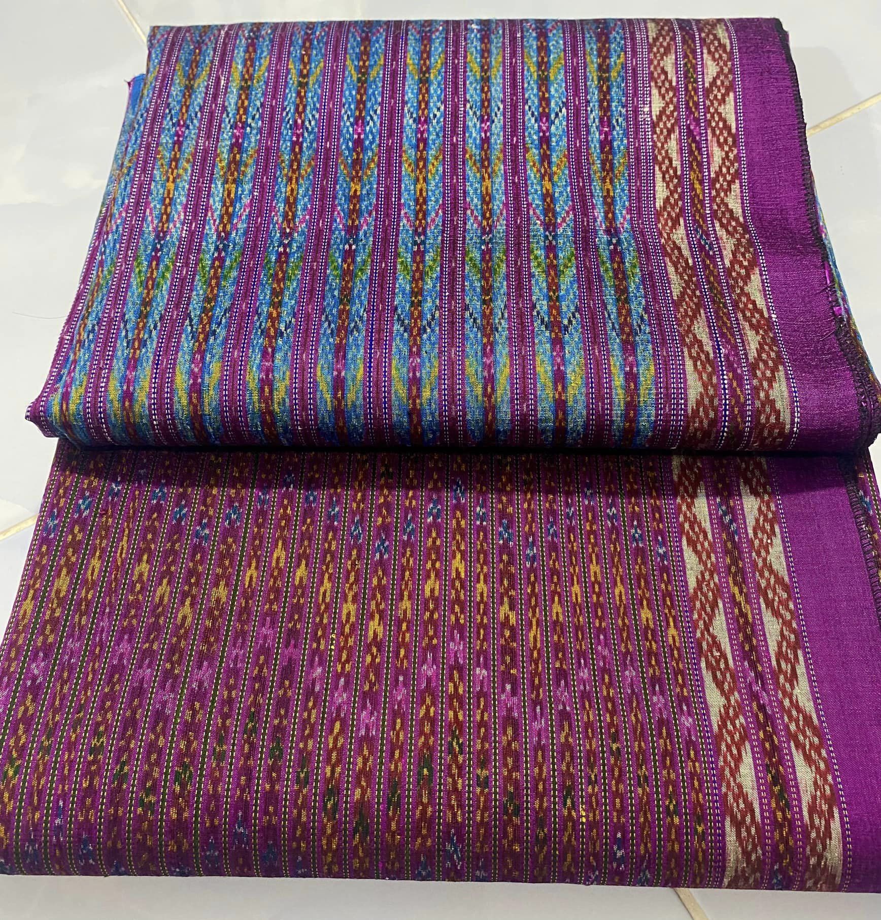 ซิ่น ผ้าไหมมัดหมี่ทอยกขิด 4ตะกอ ขนาด 1x2เมตร ลายร้อยดาว พื้นสี่่ม่วงชมพู รหัส L9A-RT-09286706312