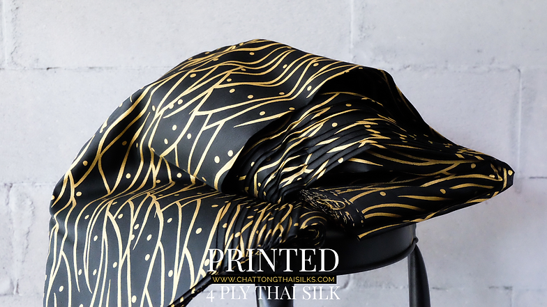 ผ้าไหมพิมพ์ลาย เนื้อเรียบ 4เส้น เฉดสีดำ เหลืองทอง ขายตามความยาวหลา รหัส A4-CT-SKU100285