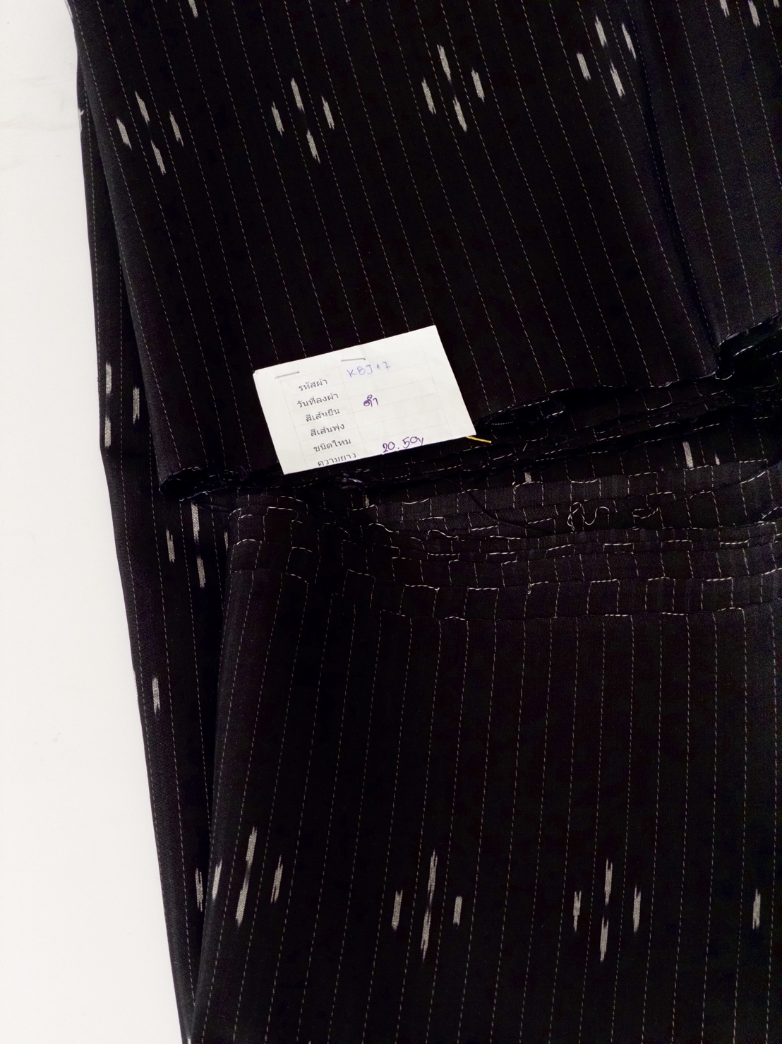 ผ้าไหมมัดหมี่ ผ้ากาบบัว ไหมแท้ ลายดอกแก้ว สีดำ ตัดขายเป็นเมตร รหัส CISP-119-KBJ17