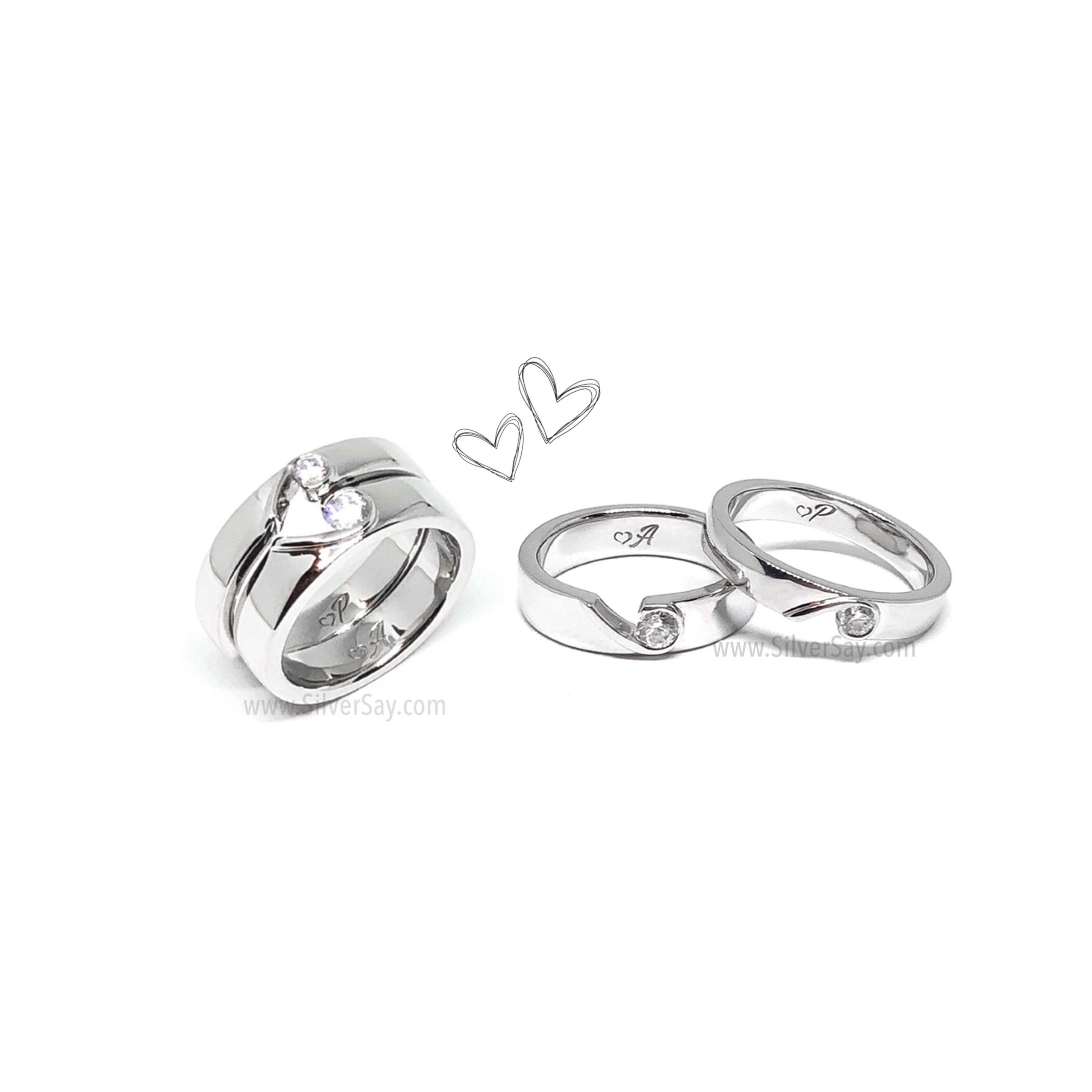 แหวนคู่สองวงประกอบกันเป็นรูปหัวใจ/สลักชื่อคู่รัก "♥ P" และ "♥A"