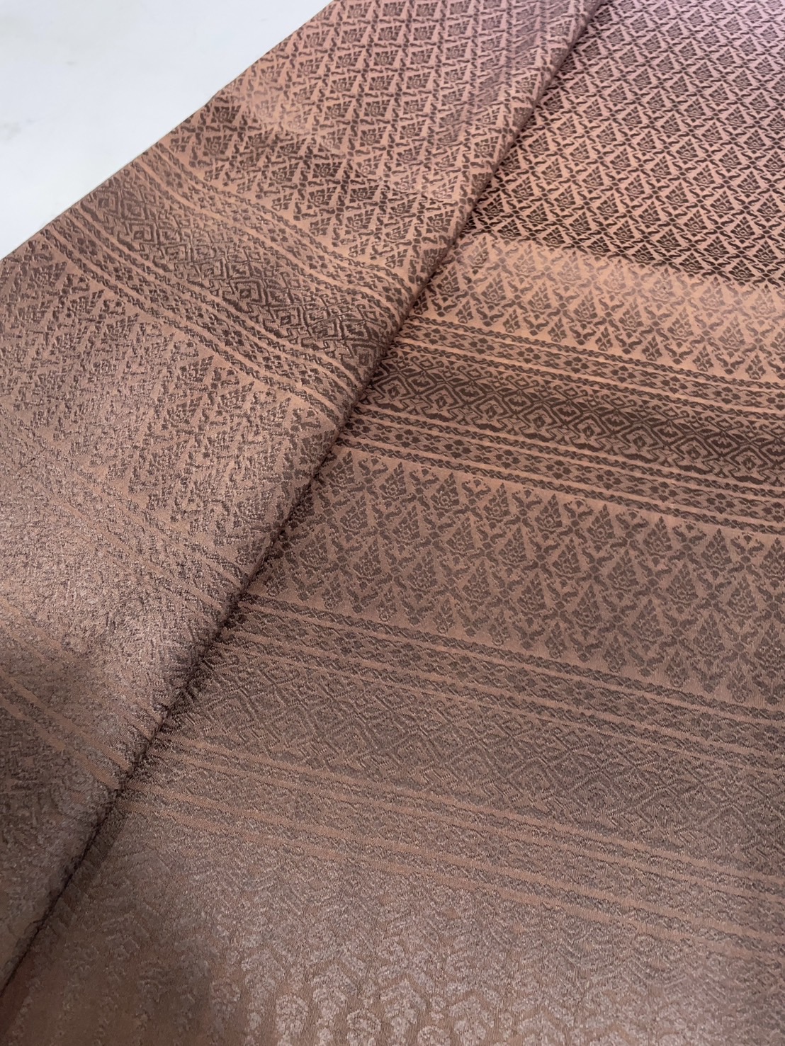 ซิ่น ผ้าไหมยกดอกสุรินทร์ 32ตะกอ ขนาด 1x2เมตร ลายเทพพนม ย้อมสไลด์สีม่วงเทาเข้ม - สีน้ำตาล รหัส N11-TT-0803684