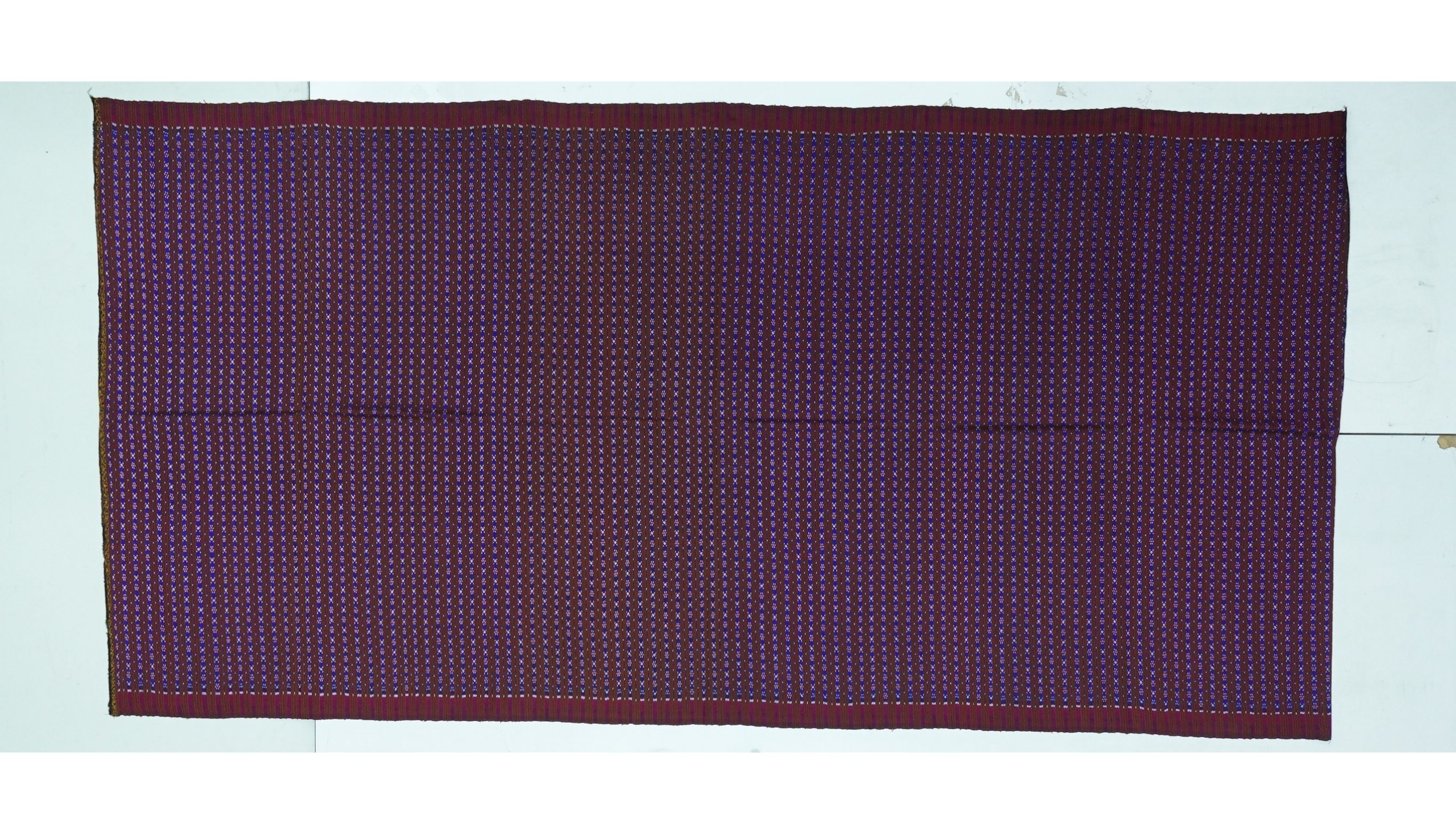 ซิ่น ผ้าไหมมัดหมี่ 3ตะกอ ขนาด 1x2เมตร พื้นสีน้ำตาล ลายดอกพิกุล รหัส R2Q-ME-066-1220670915