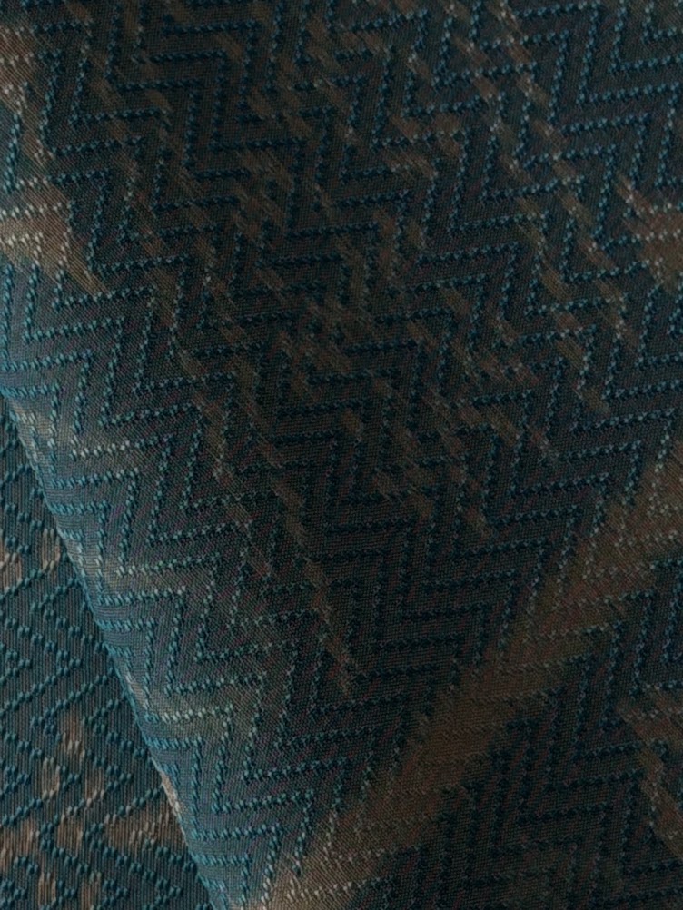 ซิ่น ผ้าไหมมัดหมี่ก้างปลา ทอยกดอก 4 ตะกอ ขนาด 1x2 เมตร ลายสิริราชพัสตราภรณ์ สีฟ้า รหัส PCS-NY-1122684