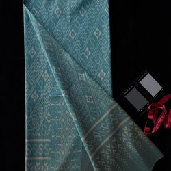 ซิ่น ผ้าไหมมัดหมี่ก้างปลา ทอยกดอก 4 ตะกอ ขนาด 1x2 เมตร ลายสิริราชพัสตราภรณ์ สีฟ้า รหัส PCS-NY-1122684