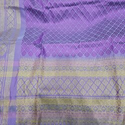 ซิ่น ผ้าไหมยกสุรินทร์ ไหมแท้ 32ตะกอ มีหน้านาง เกาะเชิงดิ้นทอง ขนาด1x2เมตร พื้นสีม่วง รหัส N11-TT-1220662