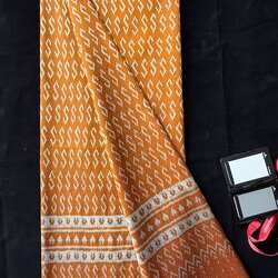 ซิ่น ผ้าไหมมัดหมี่ 3ตะกอ ขนาด 1x2 เมตร ลายขอพระราชทาน สีส้มทอง รหัส PCS-NY-11226817