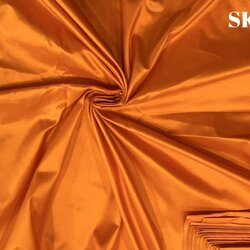 ผ้าไหมสีพื้น เนื้อเรียบ ไหมแท้ 2เส้น สีส้มทอง (ราคาต่อหลา) รหัส C-NY-SKU42827