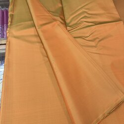 ผ้าไหมสีพื้น รุ่นเพชร เนื้อเรียบหนา ไหมแท้ สีน้ำตาลทองเหลือบส้ม (ราคาต่อหลา) รหัส C-0619672
