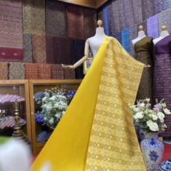 (ผ้าชุด)ไหมแพรวา ตัดชุดลายจกขิด ขนาด 63x500ซม (ลาย 2.3เมตร+สีพื้น 2.7เมตร) พื้นสีเหลือง รหัส P10-BM-111068