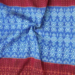 ซิ่น ผ้าไหมมัดหมี่ 3ตะกอ เนื้อไหมบ้าน ขนาด 1x2เมตร ท้องผ้าสีฟ้า ตีนแดง รหัส R2Q-PCN-0215685