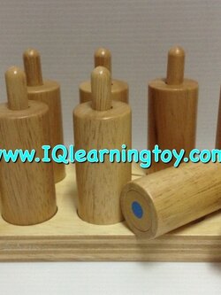 Montessori-Spring Box มอนเตสซอรี่- ชุดกล่องสปริง ประกอบด้วยฐานไม้ พร้อมแท่งไม้ทรงกระบอกมีจุก 10 แท่ง ( 5 คู่ ) ฝึกประสาทสัมผัส ส่งฟรี