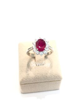 แหวนพลอยทับทิมแท้ รูปวงรี 6x8 มม.ล้อมเพชรสวิสสีขาวสิบสองเม็ด