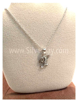 จี้อักษร X ฝังเพชรสวิส