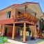 5-039 บ้านน็อคดาวน์ หลังใหญ่ ทรงจั่วมุกซ้อนสีส้ม