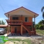 5-039 บ้านน็อคดาวน์ หลังใหญ่ ทรงจั่วมุกซ้อนสีส้ม