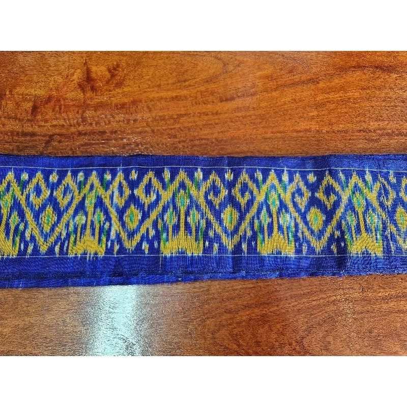 ตีนซิ่นลายมัดหมี่ ไหมแท้ ทอมือ ขนาด 4.5นิ้วx2เมตร สีน้ำเงิน รหัส WN-119-0507688